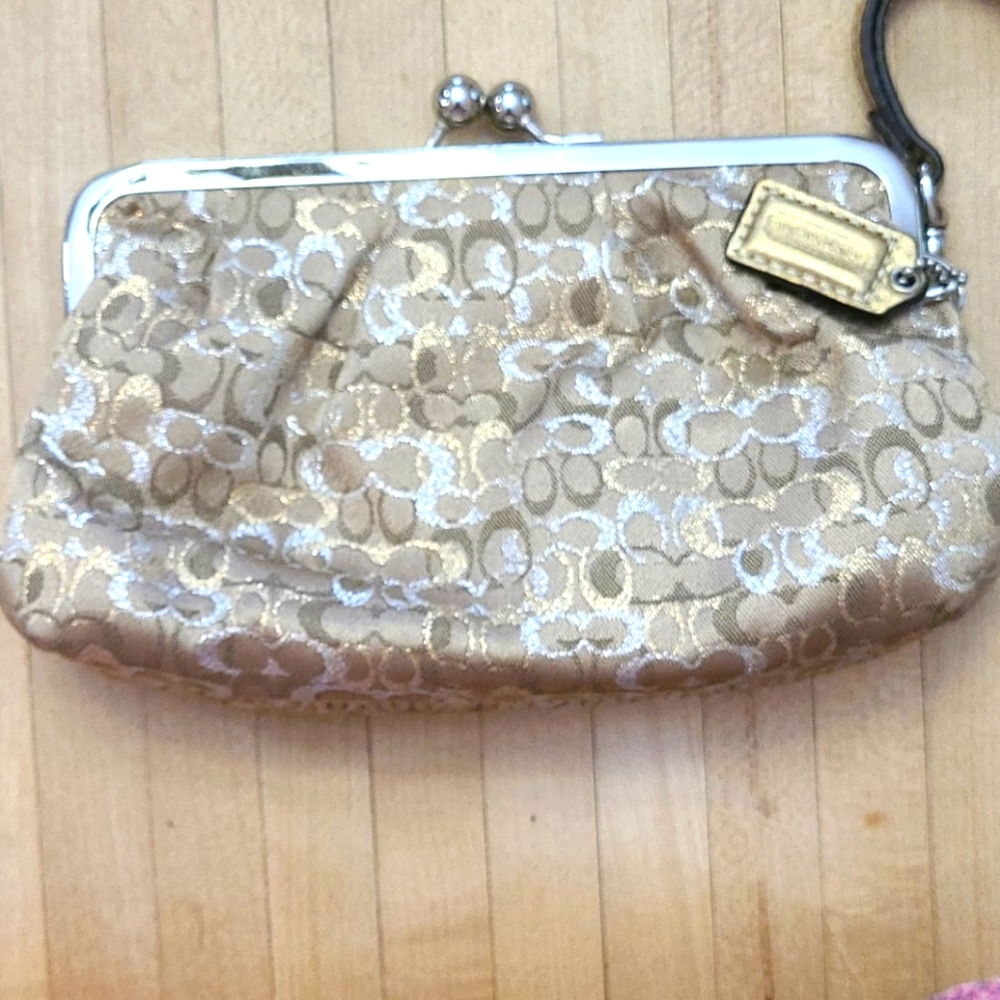 Coach gold and silver wristlet